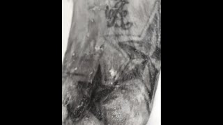 Police hope tattoos will help identify body found by construction workers