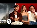 "It's very spooky!" Glen Powell, Daisy Edgar-Jones and Anthony Ramos talk Twisters and film clichés