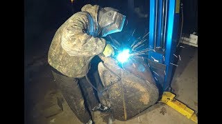 Welding an excavator bucket