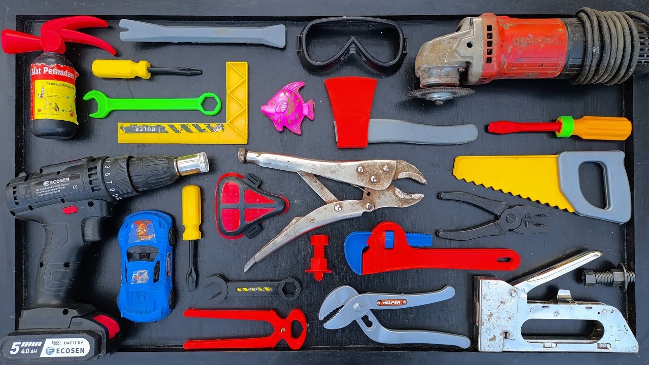 Collection of Repair Tools, Electric Drill, Electric Saw, Hammer With Wriench, Pliers, Hacksaw