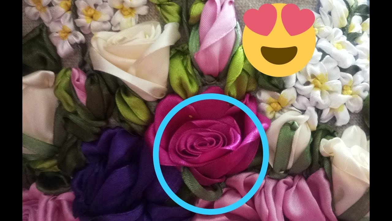 تطريز وردة في طور التفتح بشرائط الساتان