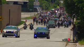 RAW: Protesters march across the Triad