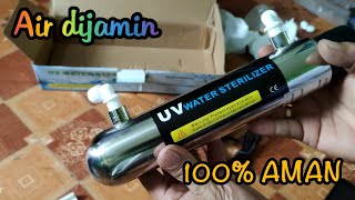 Memperbaiki lampu UV depot air minum