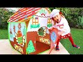 Alice prepares a gingerbread house for kids
