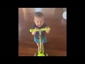 Little boy playing on the scooter.Маленький мальчик играет на самокате.