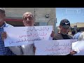 وقفة في دير البلح وسط قطاع غزة لتسليط الضوء على الأوضاع المعيشية الصعبة للعمال والمطالبة بحقوقهم
