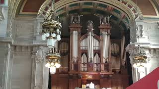 The Vast Concert Pipe Organ being played at the Glasgow Art Gallery.