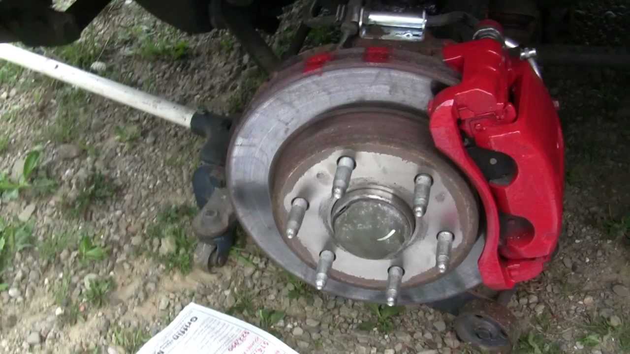 how to jack up suburban/silverado 4X4 and take tires off and paint callipers YouTube
