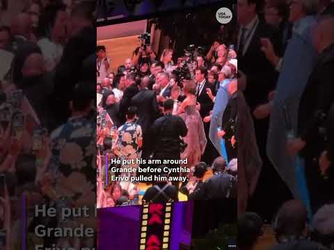 Security rushes to Ariana Grande after fan jumps barricade at ‘Wicked: For Good’ premiere