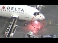 Watch  passengers deplane after fire under cockpit of delta airlines aircraft