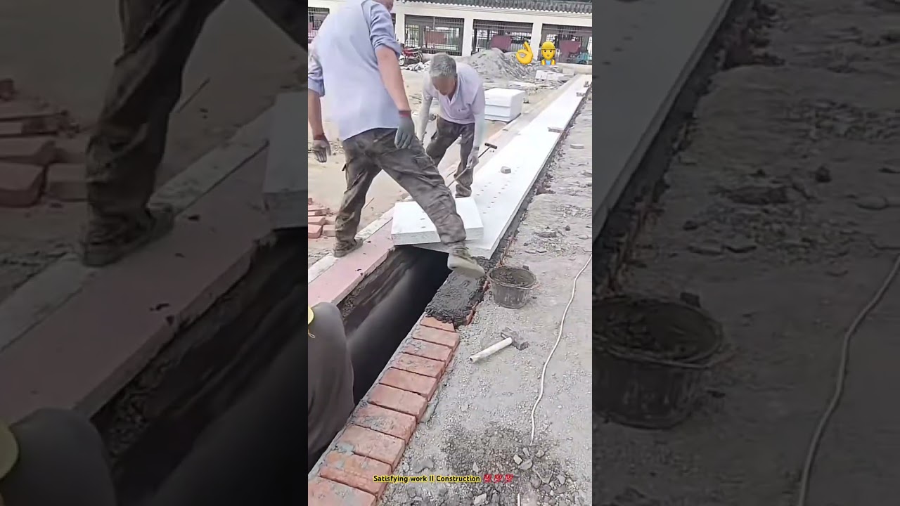 Concrete lid covering drainage ditch