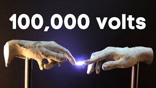 100,000 volts running through sculpture!!  - Hand of God art