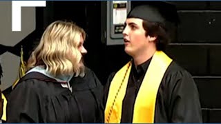 Austin Metcalf's twin brother accepted a posthumous diploma on Austin's behalf at graduation.
