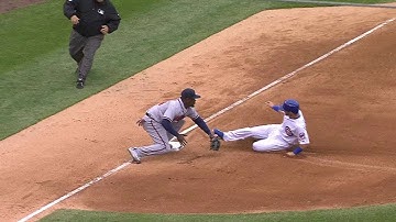 ATL@CHC: Johnson fields bunt, nabs La Stella at third