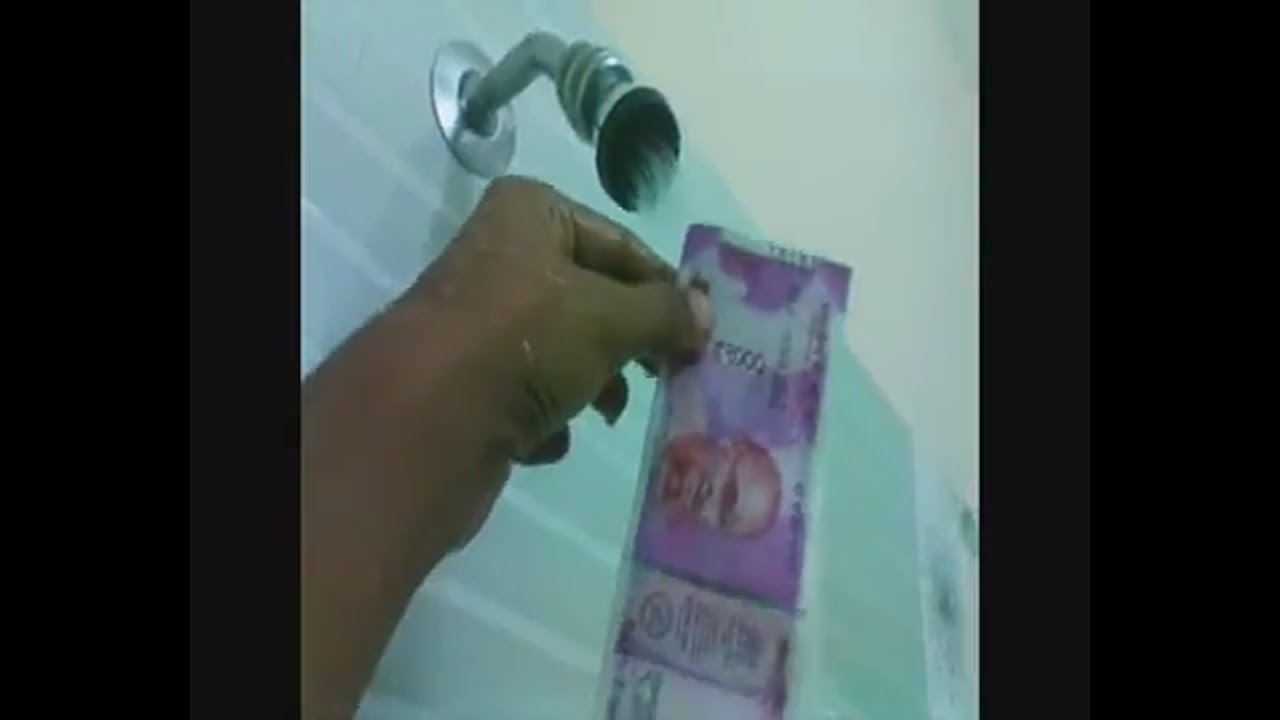 Washing test of 2000 rs note and see what happen