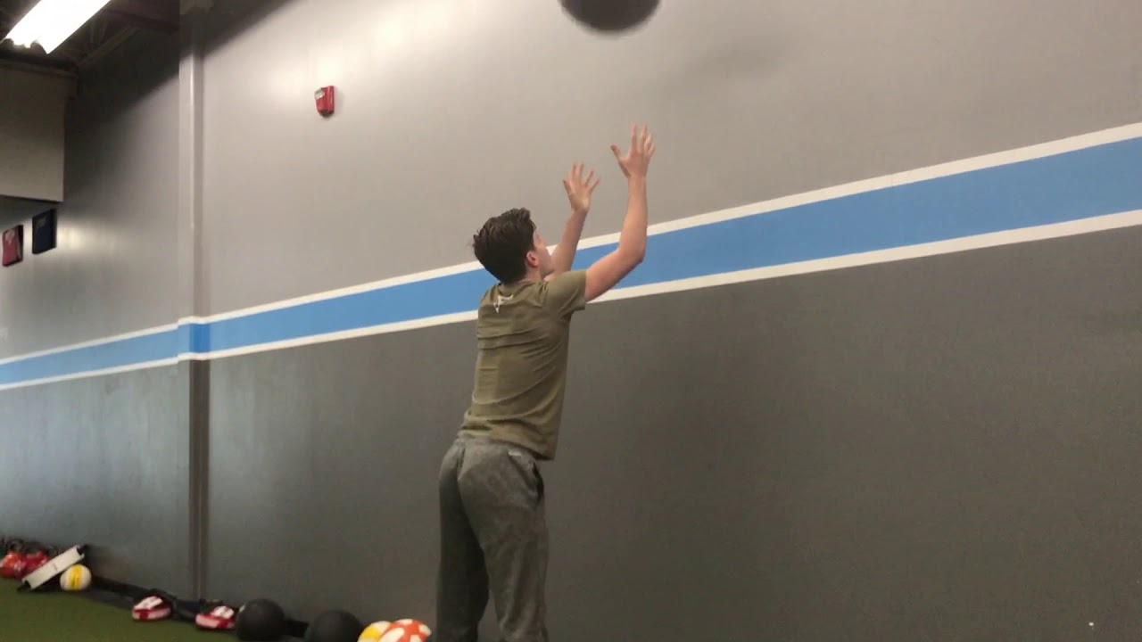 Wall ball squat thruster YouTube