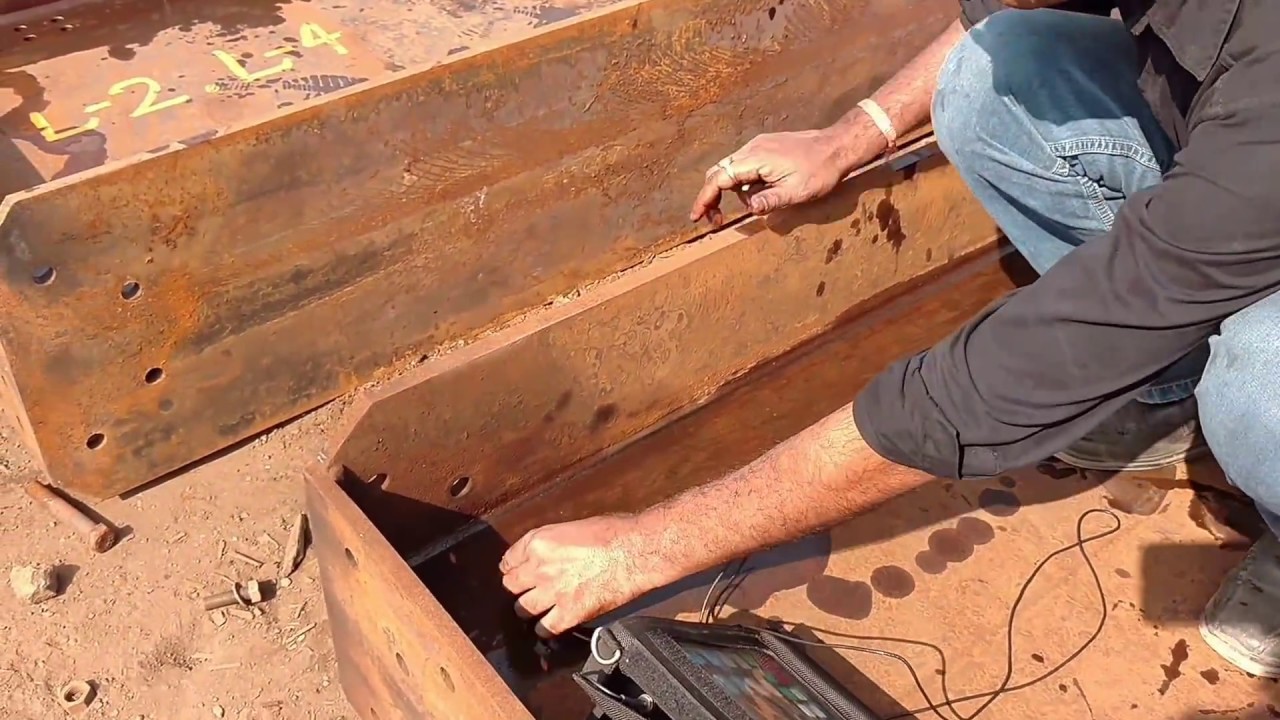 Ultrasonic testing (UT) of welds.