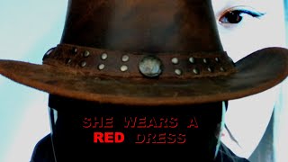 SHE WEARS A RED DRESS