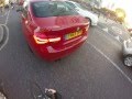 Red BMW 320i side swipes me - EN65 OPH