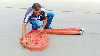 تدريب العاملين على فرد الخرطوم ولمه بعد عمليه اطفاء الحريق