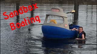 Kid turns toy sand box into fishing boat!