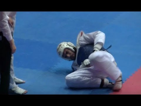 Taekwondo - a painful kick in the nuts / balls