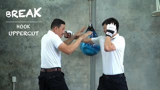 Tập 8: Cách tự vệ trước những cú đấm Móc và Xốc- How to Break hooks and uppercuts!