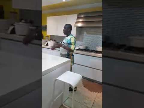 King wasiu ayinde marshal cooking food