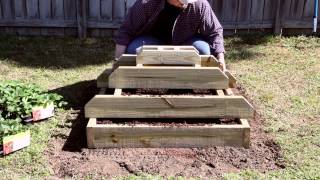 http://bonnieplants.com How to build a strawberry pyramid. Grow lots of strawberries in a small space with this pyramid. Prepare the 