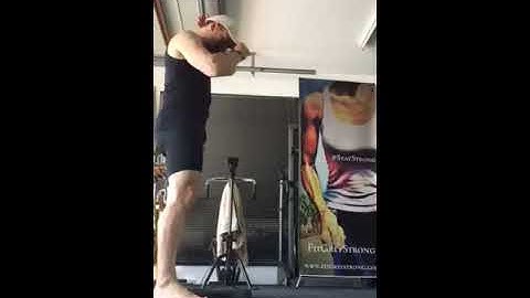 Overhead plate Bulgarian split squats