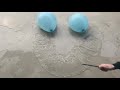 Popping balloons in the shape of a smiley face :SHORT: