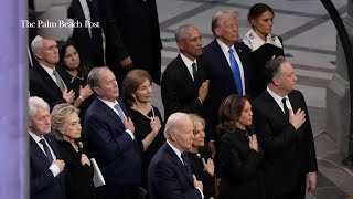 Thumbnail for Trump departs Jimmy Carter funeral after shaking hands with Obama, Bush at National Cathedral