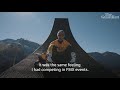 Motocross ace Tom Pages performs double front flip off cliff before parachuting down
