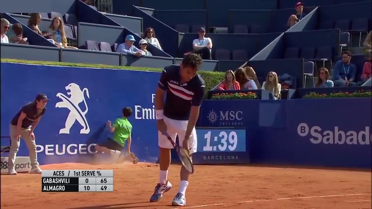 Tennis Ball Boy Faceplants into Wall! MUST SEE! YouTube