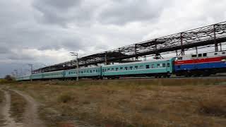 Тепловоз ТЭ33А-0215 с пассажирским поездом № 039Т Челябинск — Астана