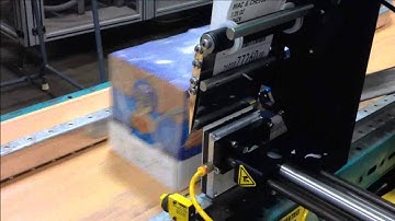 Label Applicator Applies Labels to the Side of Shrink Wrapped Bundle