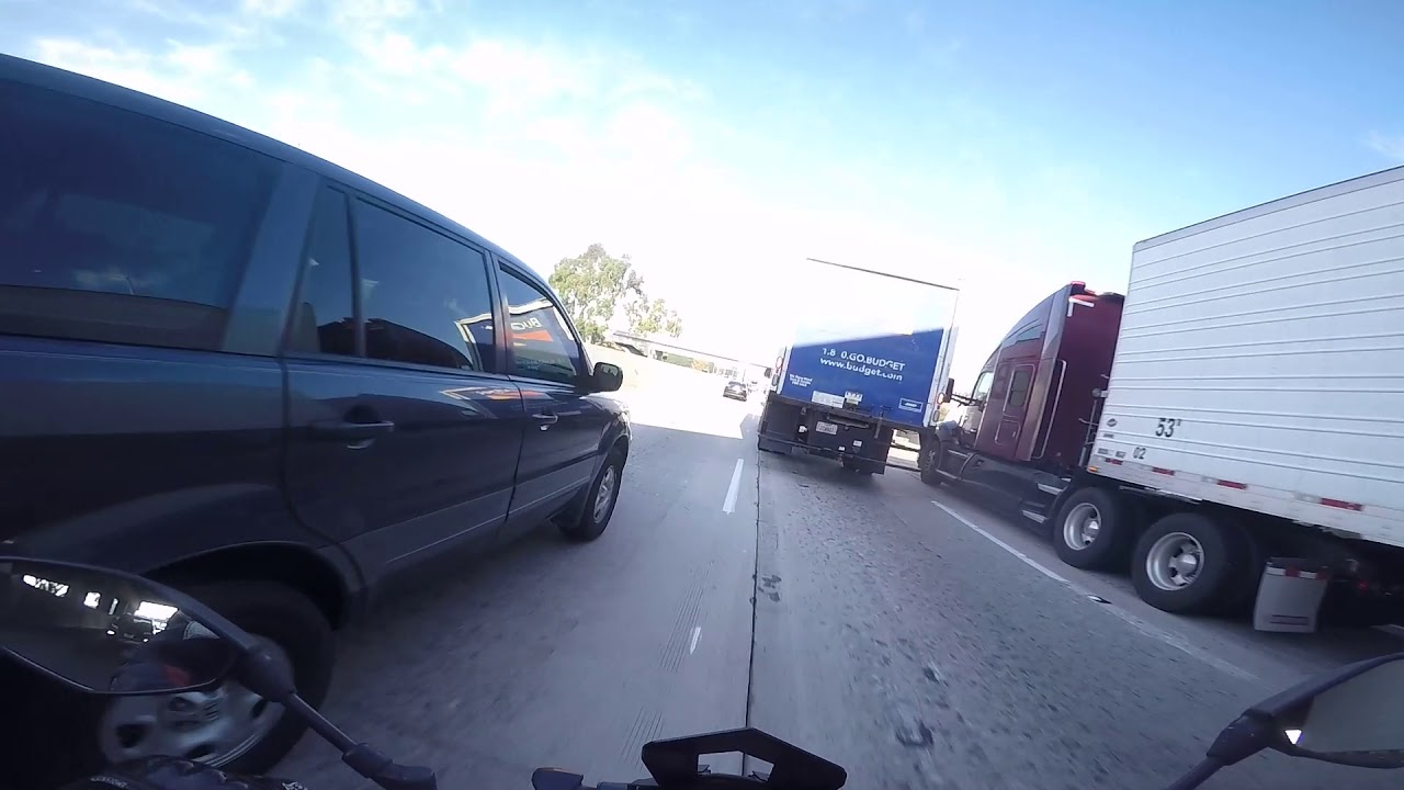 motorcycle accident splitting lanes freeway - YouTube