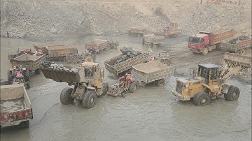 Caterpillar 966E & 966F Wheel Loaders Loading Rocks | Powerful Heavy Equipment