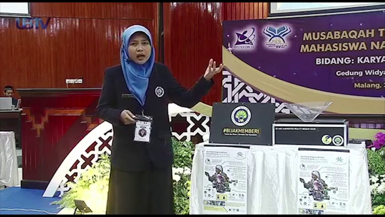 Presentasi Musabaqah Karya Tulis Ilmiah Al-Qur'an MTQ MN tim UM (Tsania Nur Diyana & Zuraidah Zeni)