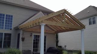 Archadeck of Chicagoland built this double rafter, gable style pergola with round tuscan columns for our client in Lake In The Hills, IL