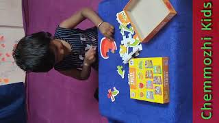 3 Year Old Girl Aathira solves Jigsaw Puzzle of Fruits - Kids Learning Activity - Chemmozhi Kids screenshot 1