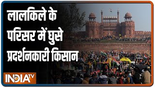 Tractor March: Protestors barge into Red Fort, plant own flag