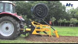 AFT 100 tractor mounted trencher with vertical pipe reel http://www.trenchers.co.uk