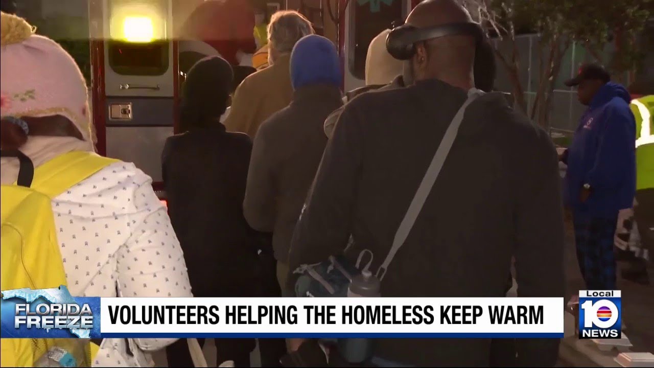 Volunteers help South Florida homeless keep warm - YouTube