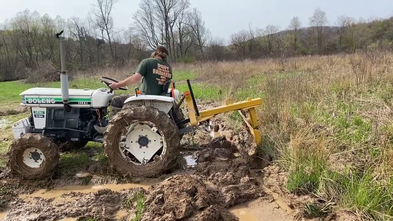 Creating a water ditch for road crossing at a swamp