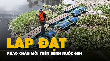 Lắp đặt phao chắn mới, tiện lợi cho việc vớt rác trên kênh Nước Đen ở Bình Hưng Hòa