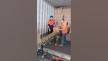Unloading cartons by gravity skate wheel conveyor
