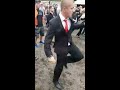 Guy looks out of place wearing a suit to a festival until the beat drops  contentbible