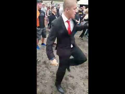 Guy Looks Out Of Place Wearing A Suit To A Festival- Until The Beat Drops  CONTENTbible