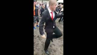 Guy looks out of place wearing a suit to a festival, until the beat drops | CONTENTbible Resimi